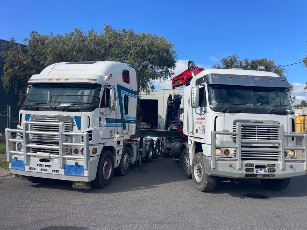 pair of Argosy 8x4 Crane Trucks